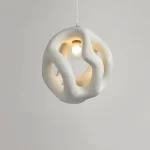 Wabi-Sabi Elegance: White Sphere Pendant Light with Twisted Design