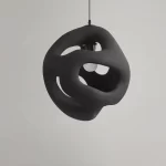 Wabi-Sabi Elegance: White Sphere Pendant Light with Twisted Design - Image 10