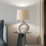 Textured Elegance: Sculpted Base Table Lamp with Fabric Shade - Image 5
