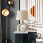 Textured Elegance: Sculpted Base Table Lamp with Fabric Shade - Image 4