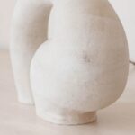 Textured Elegance: Sculpted Base Table Lamp with Fabric Shade - Image 7